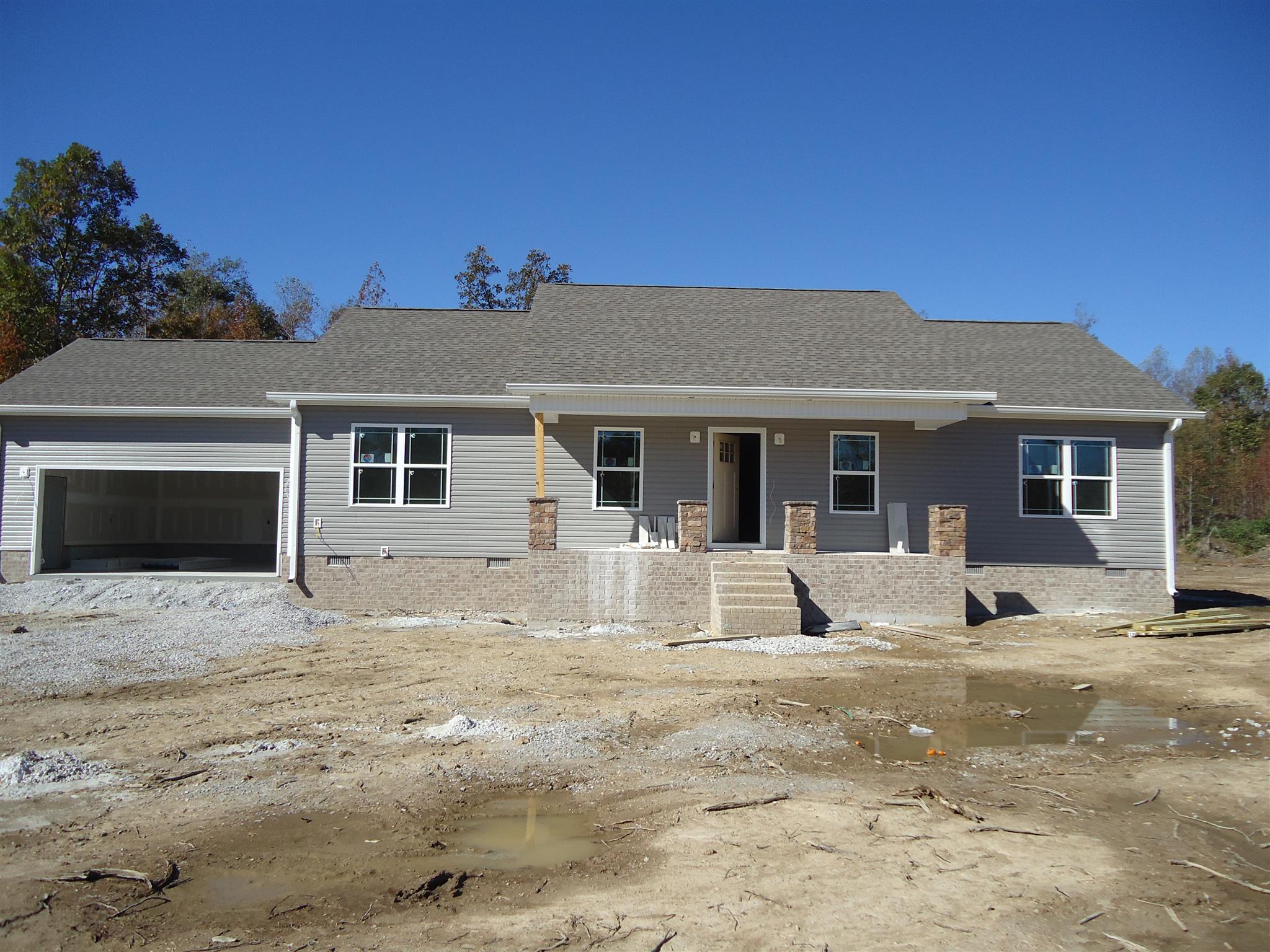 100 Ballard Road Manchester, TN 37355 - Photo 2 of 9 a front view of a house with a sitting area