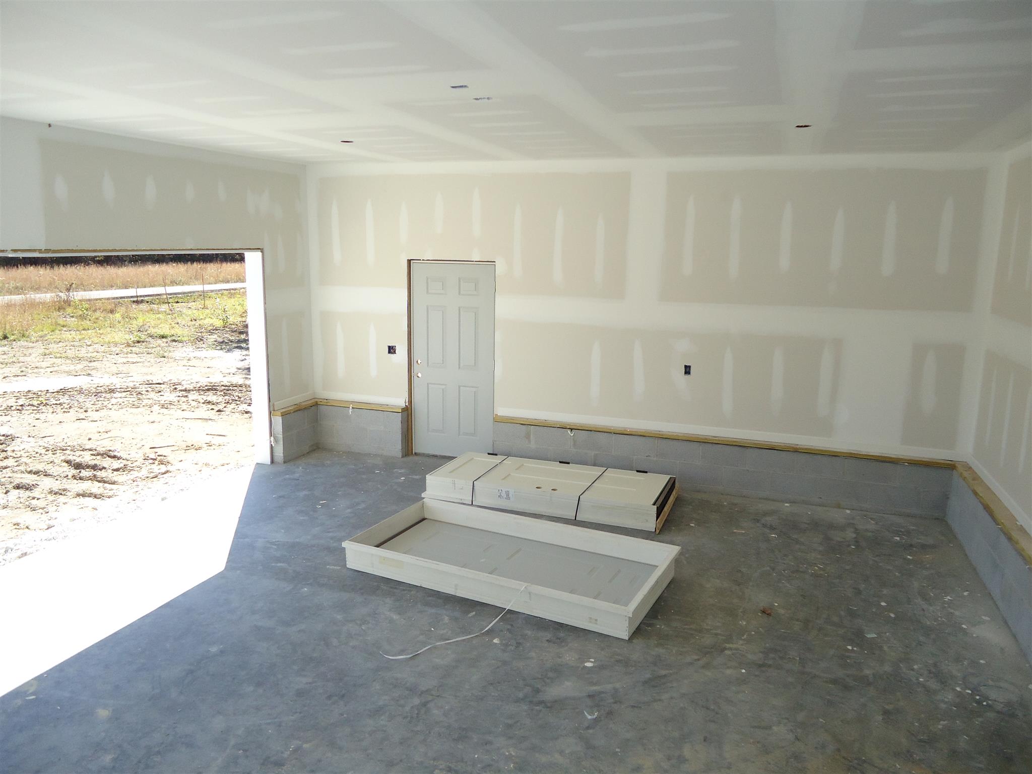 100 Ballard Road Manchester, TN 37355 - Photo 9 of 9 a spacious bedroom with a bed and a window