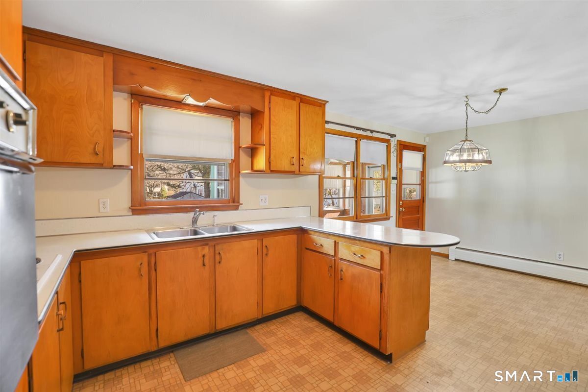 57 Alanby Drive Meriden, CT 06451 - Photo 6 of 20 a kitchen with stainless steel appliances granite countertop a sink and a cabinets