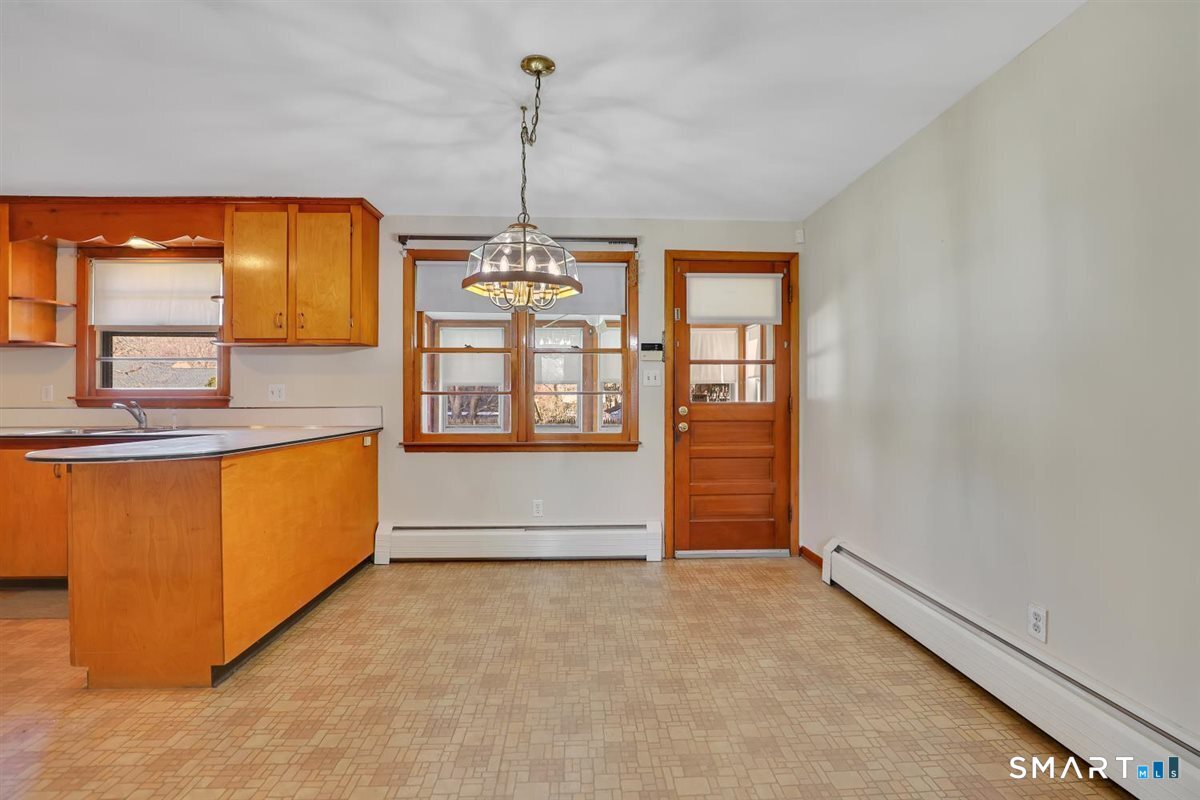 57 Alanby Drive Meriden, CT 06451 - Photo 7 of 20 a view of an empty room with a window