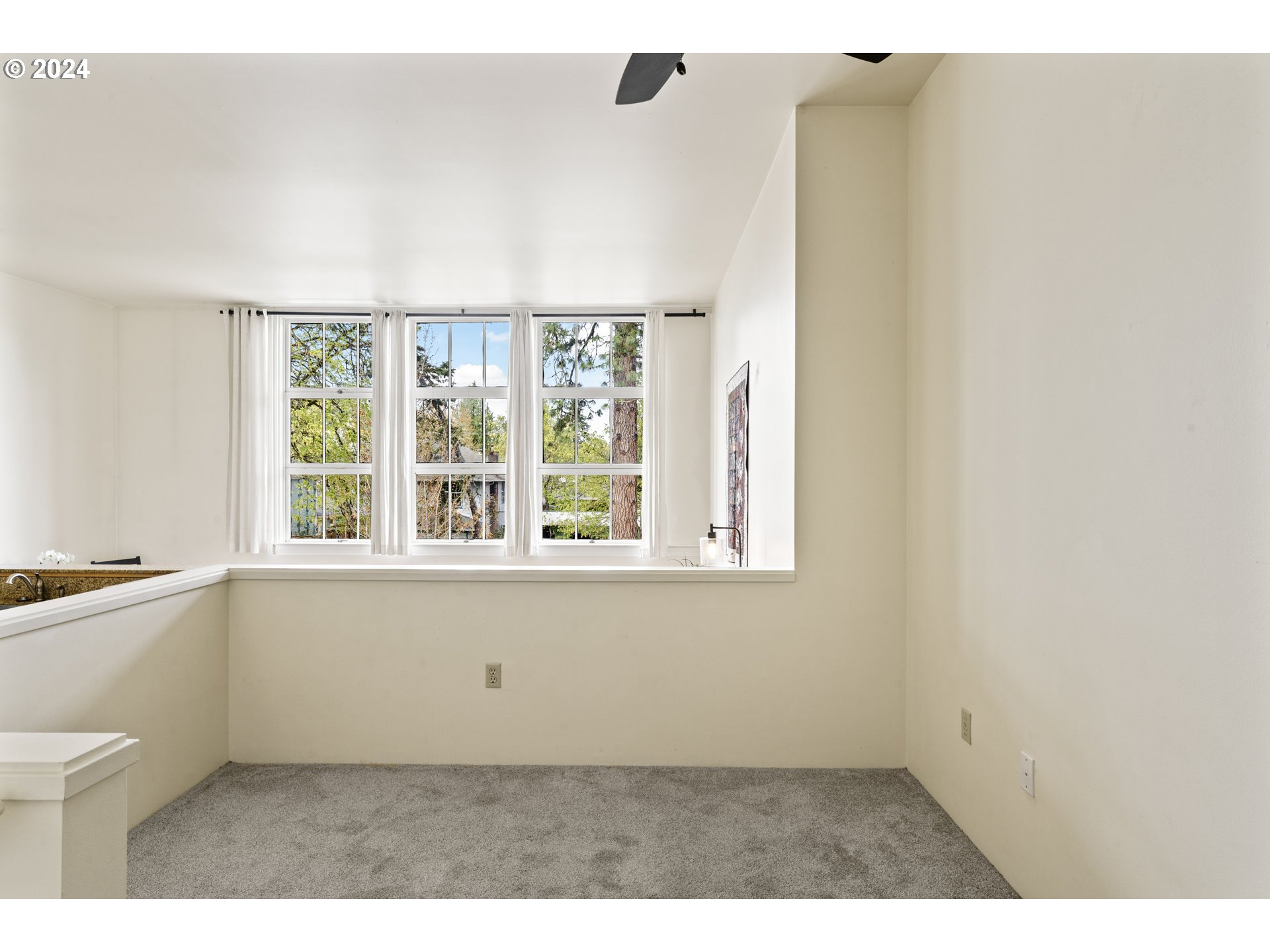 650 West 12th Avenue, Unit 202 Eugene, OR 97402 - Photo 14 of 30 a view of an empty room with a window