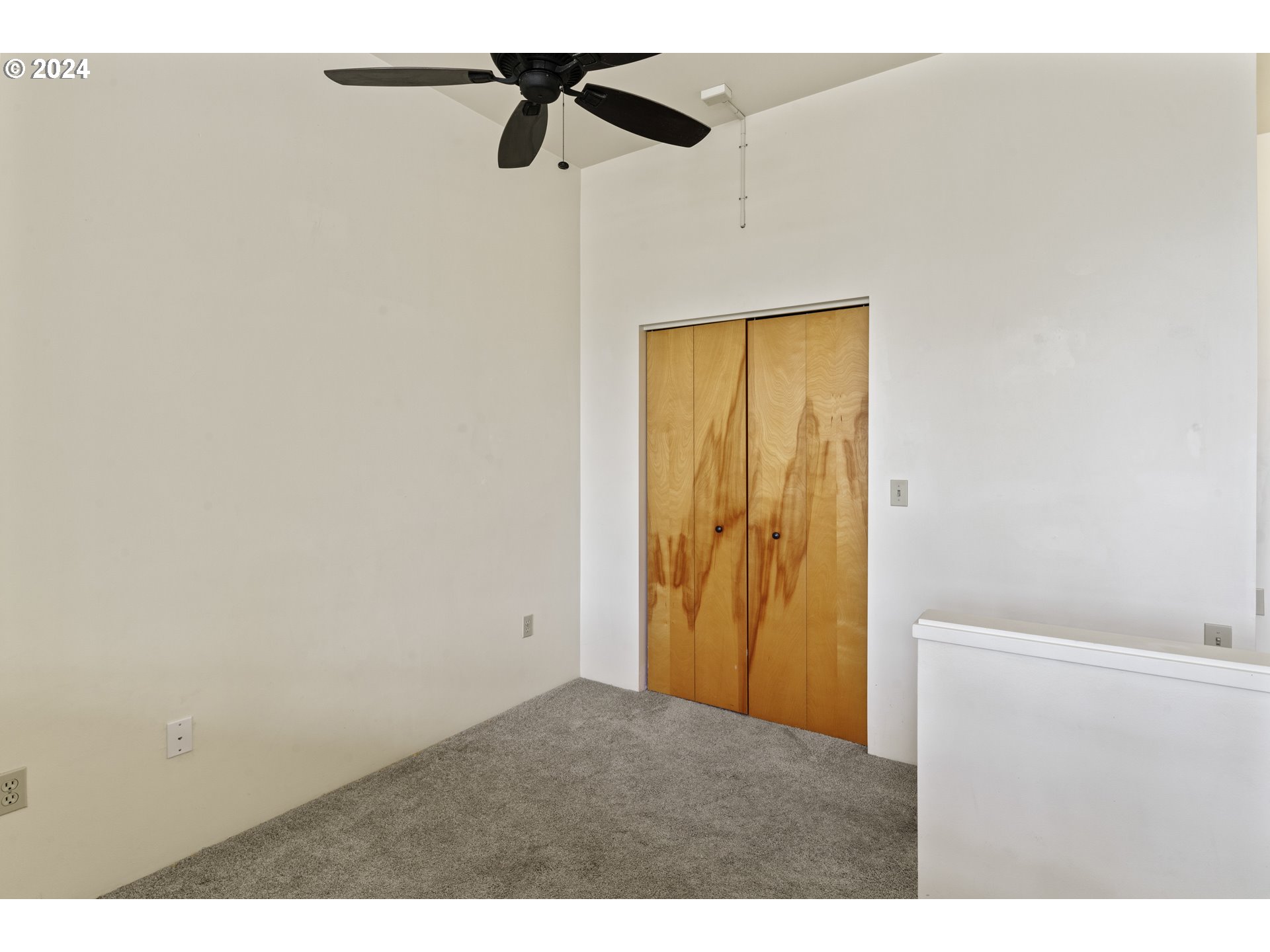 650 West 12th Avenue, Unit 202 Eugene, OR 97402 - Photo 15 of 30 a view of a ceiling fan in a room