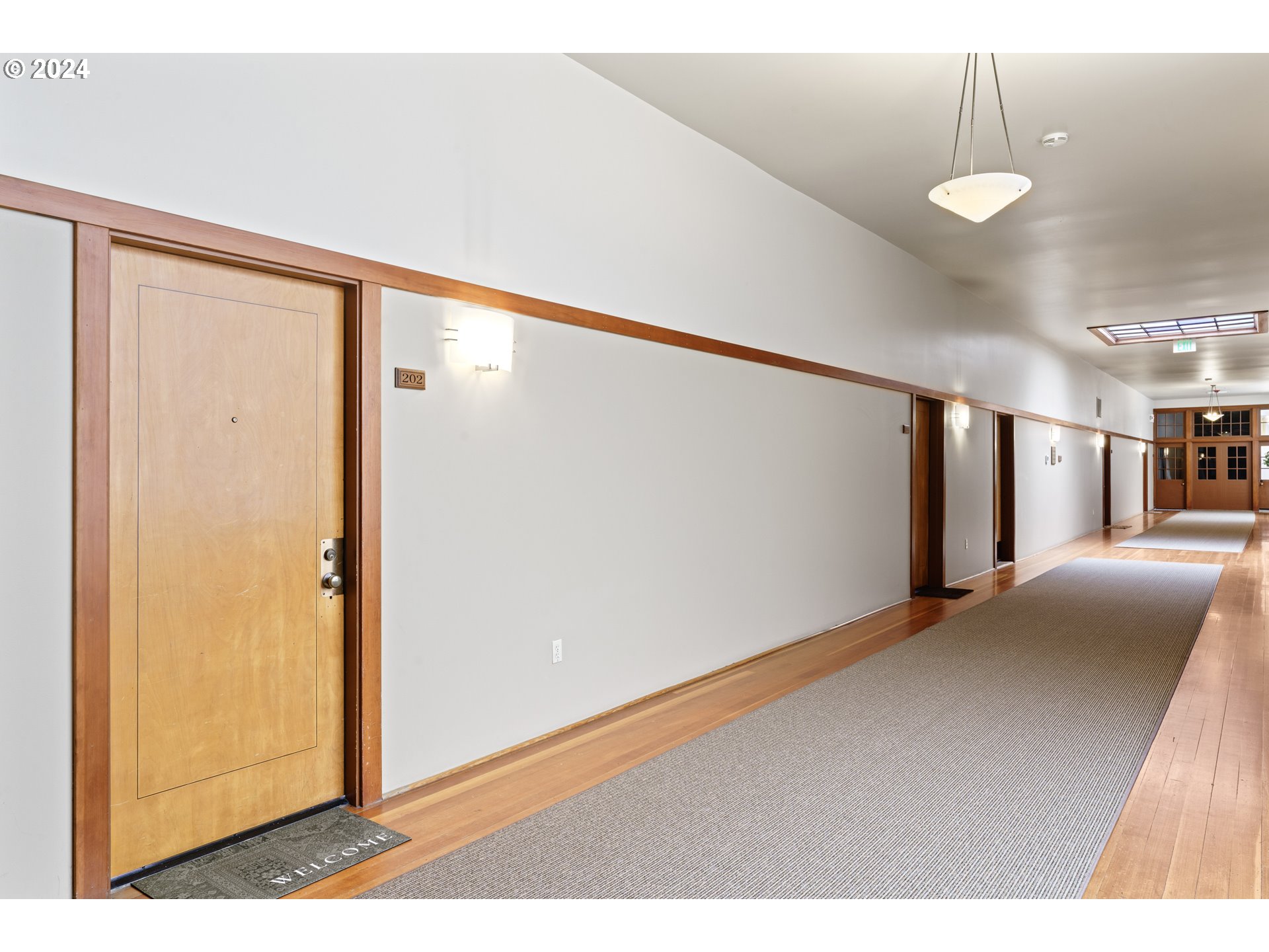650 West 12th Avenue, Unit 202 Eugene, OR 97402 - Photo 18 of 30 a view of entryway with wooden floor