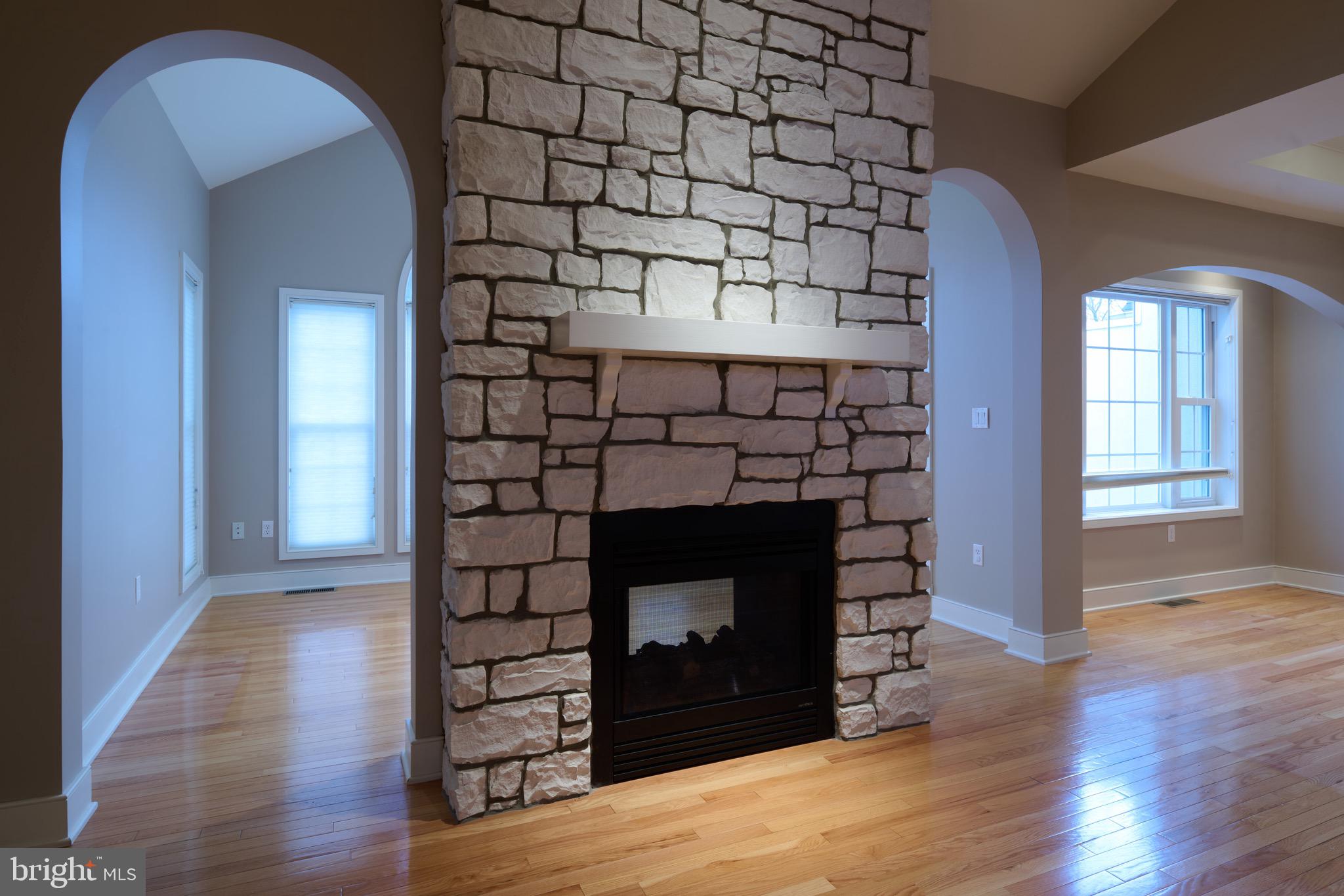 3222 Shellers Bend, Unit 209 State College, PA 16801 - Photo 11 of 76 Living room gas fireplace--with dual views