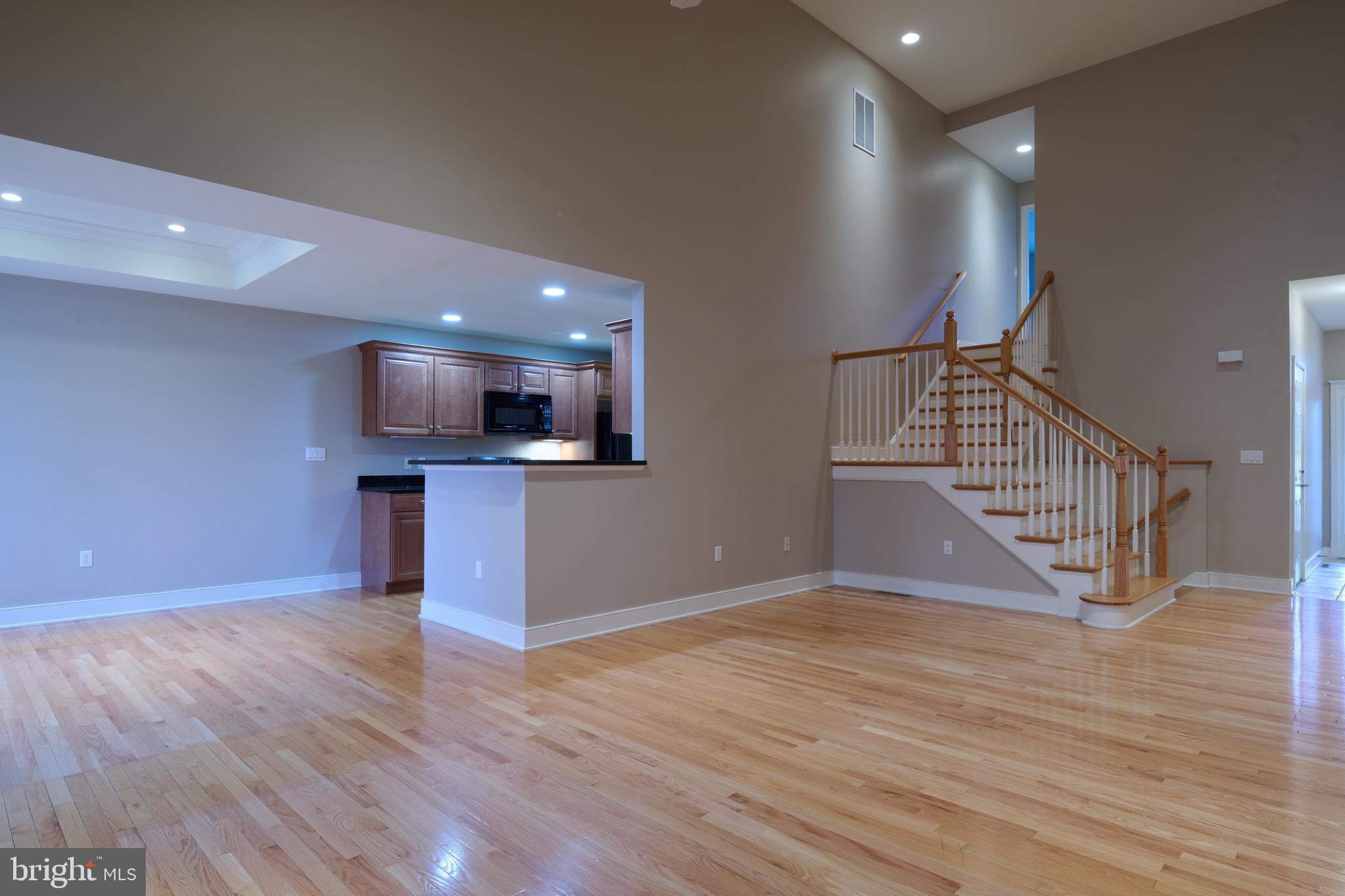 3222 Shellers Bend, Unit 209 State College, PA 16801 - Photo 12 of 76 a view of kitchen and wooden floor