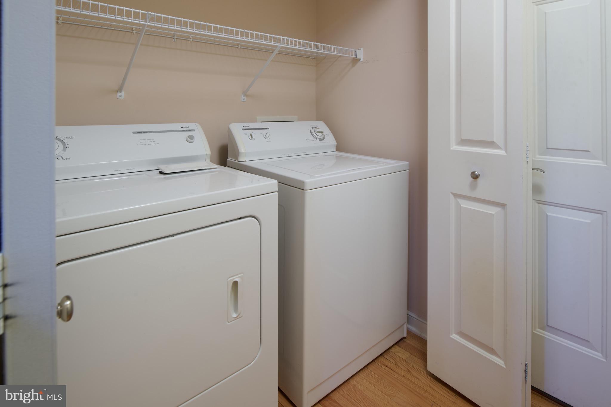 3222 Shellers Bend, Unit 209 State College, PA 16801 - Photo 26 of 76 a view of storage and utility room with washer and dryer