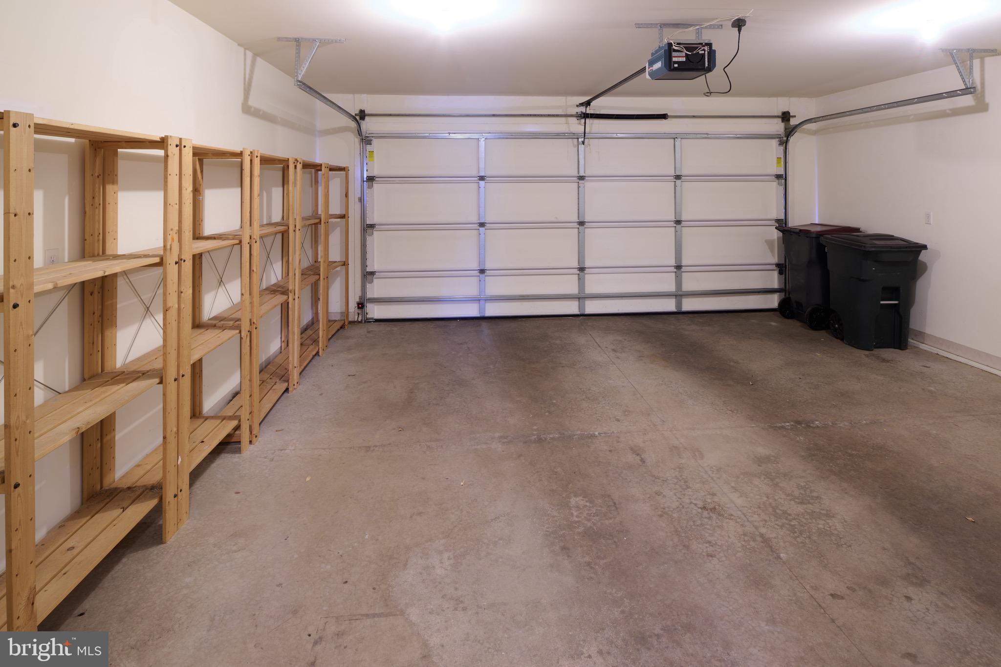 3222 Shellers Bend, Unit 209 State College, PA 16801 - Photo 27 of 76 Garage with storage shelves