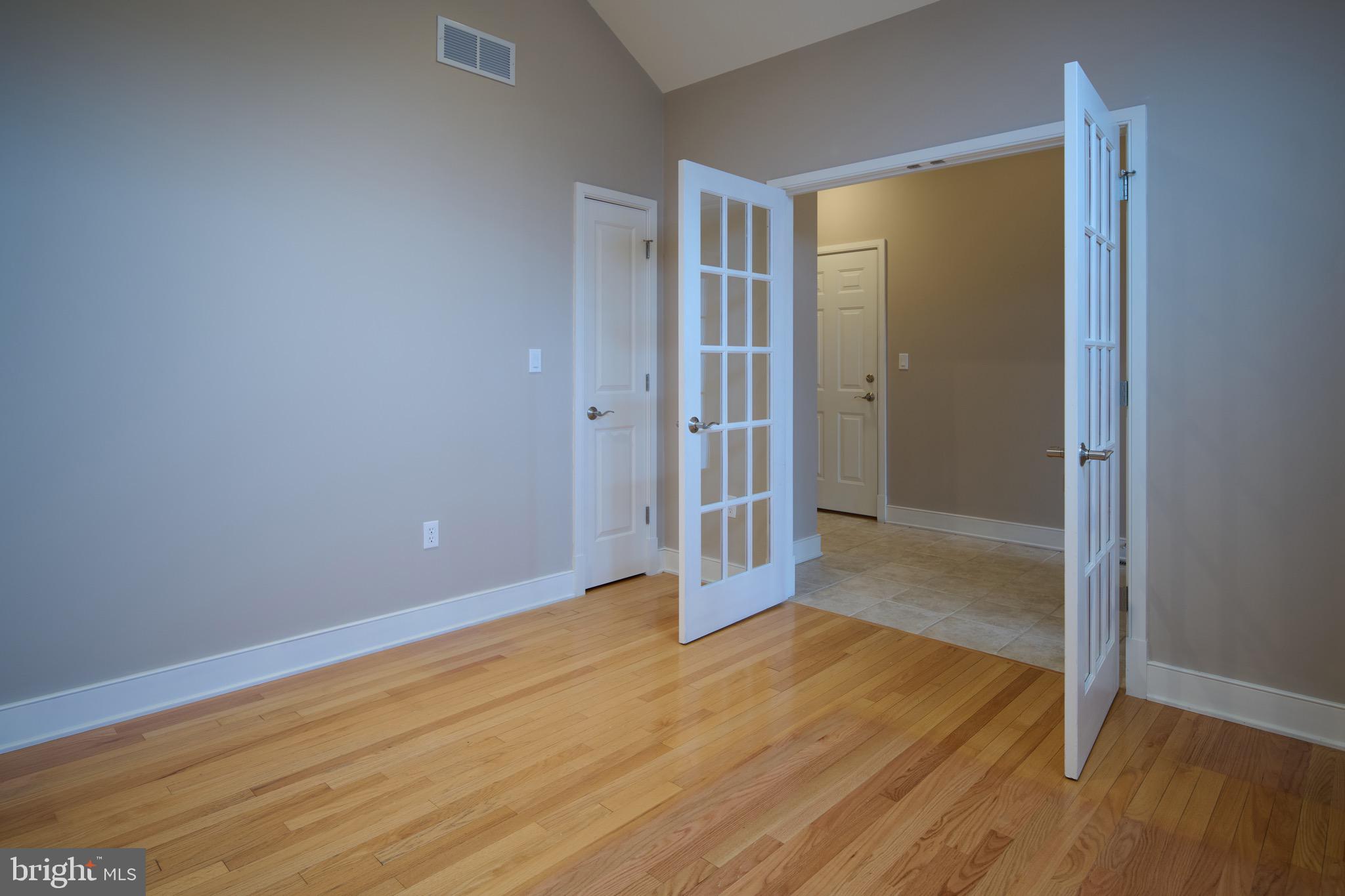 3222 Shellers Bend, Unit 209 State College, PA 16801 - Photo 4 of 76 a view of empty room with wooden floor