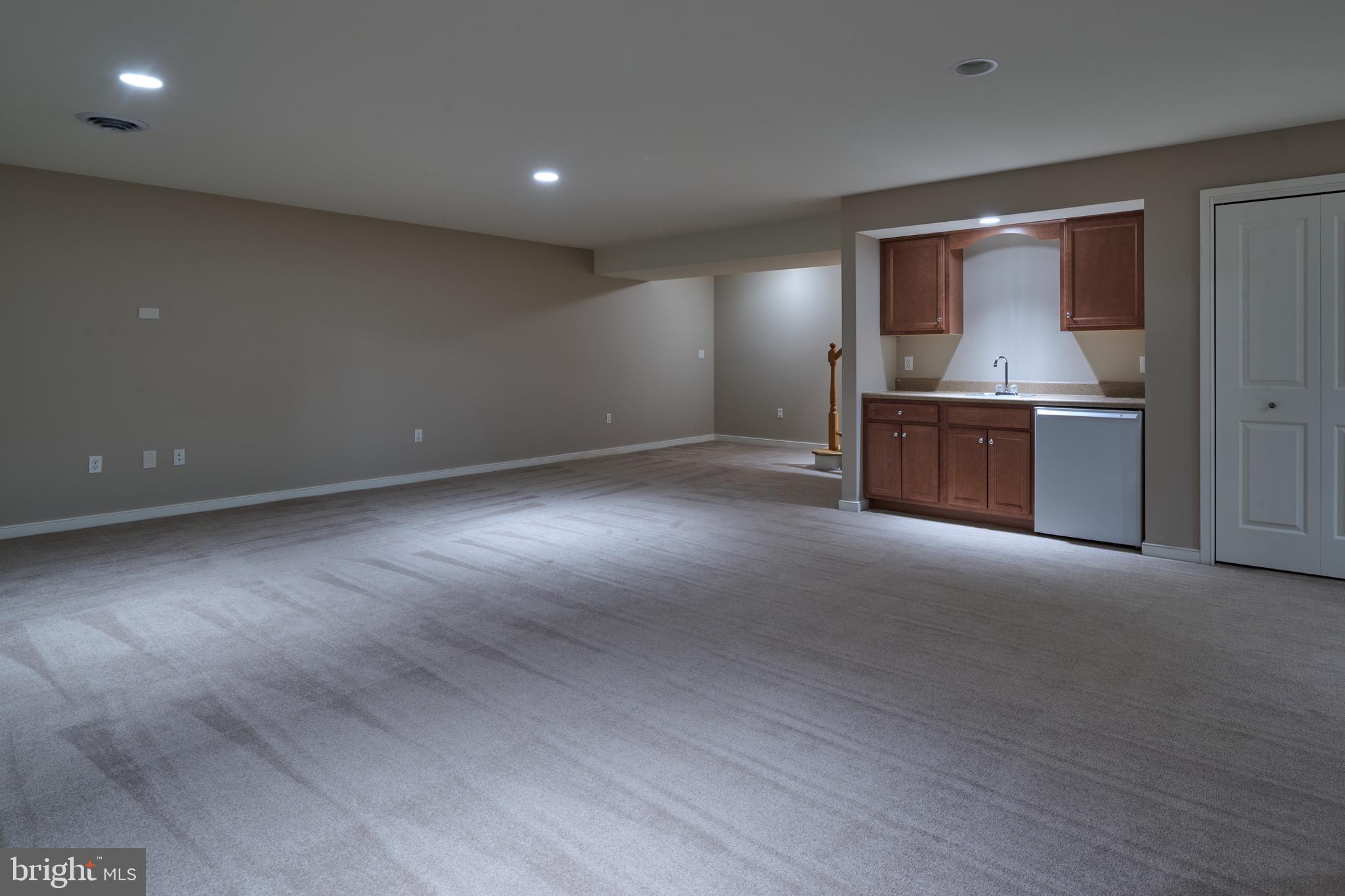 3222 Shellers Bend, Unit 209 State College, PA 16801 - Photo 43 of 76 Huge recreation room with wet bar