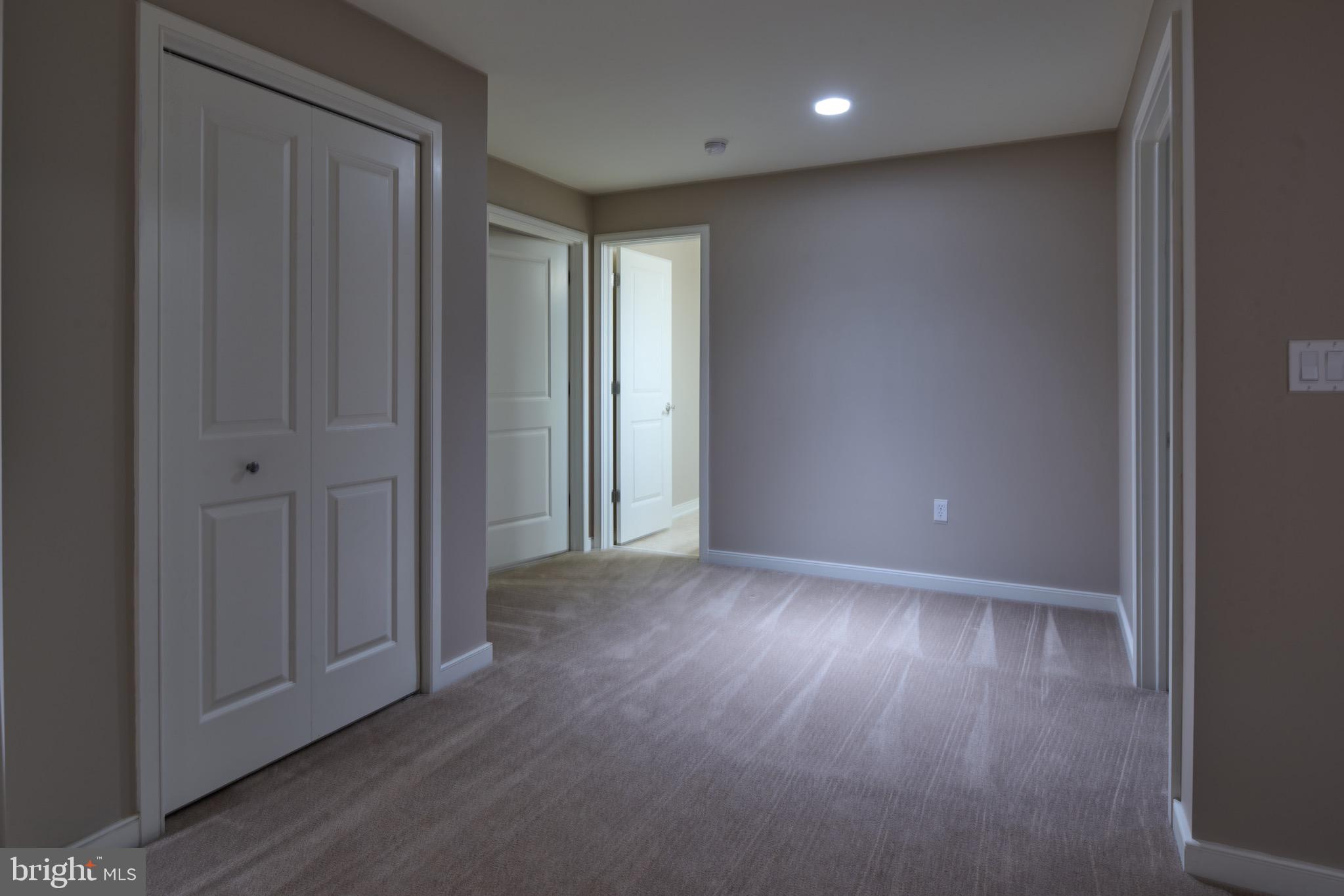 3222 Shellers Bend, Unit 209 State College, PA 16801 - Photo 45 of 76 a view of a hallway with wooden floor