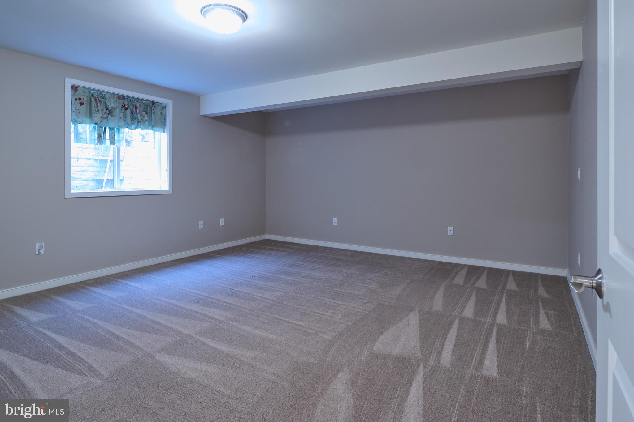 3222 Shellers Bend, Unit 209 State College, PA 16801 - Photo 51 of 76 a view of an empty room with a window