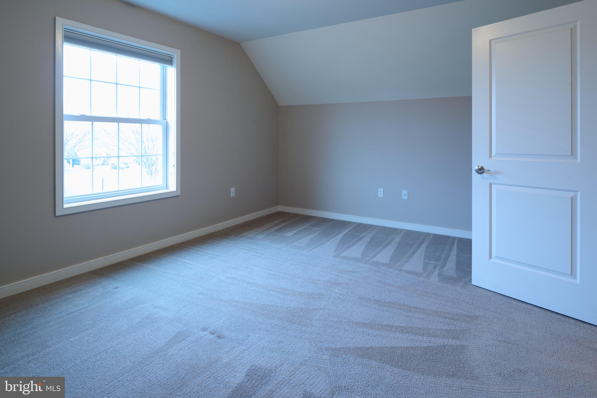 3222 Shellers Bend, Unit 209 State College, PA 16801 - Photo 61 of 76 an empty room with a window