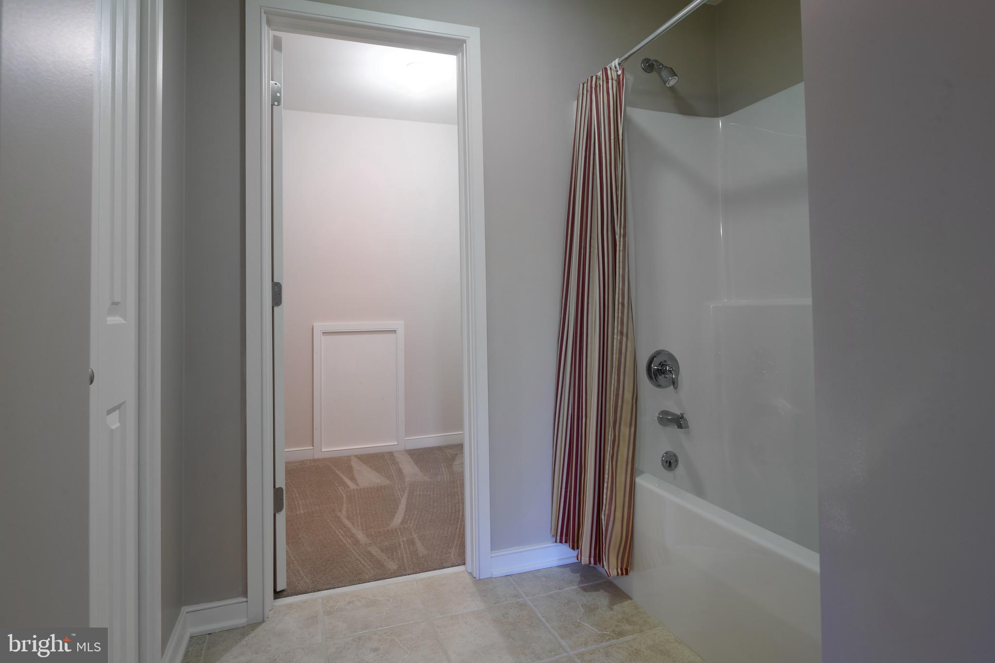 3222 Shellers Bend, Unit 209 State College, PA 16801 - Photo 63 of 76 a bathroom with a bathtub and shower