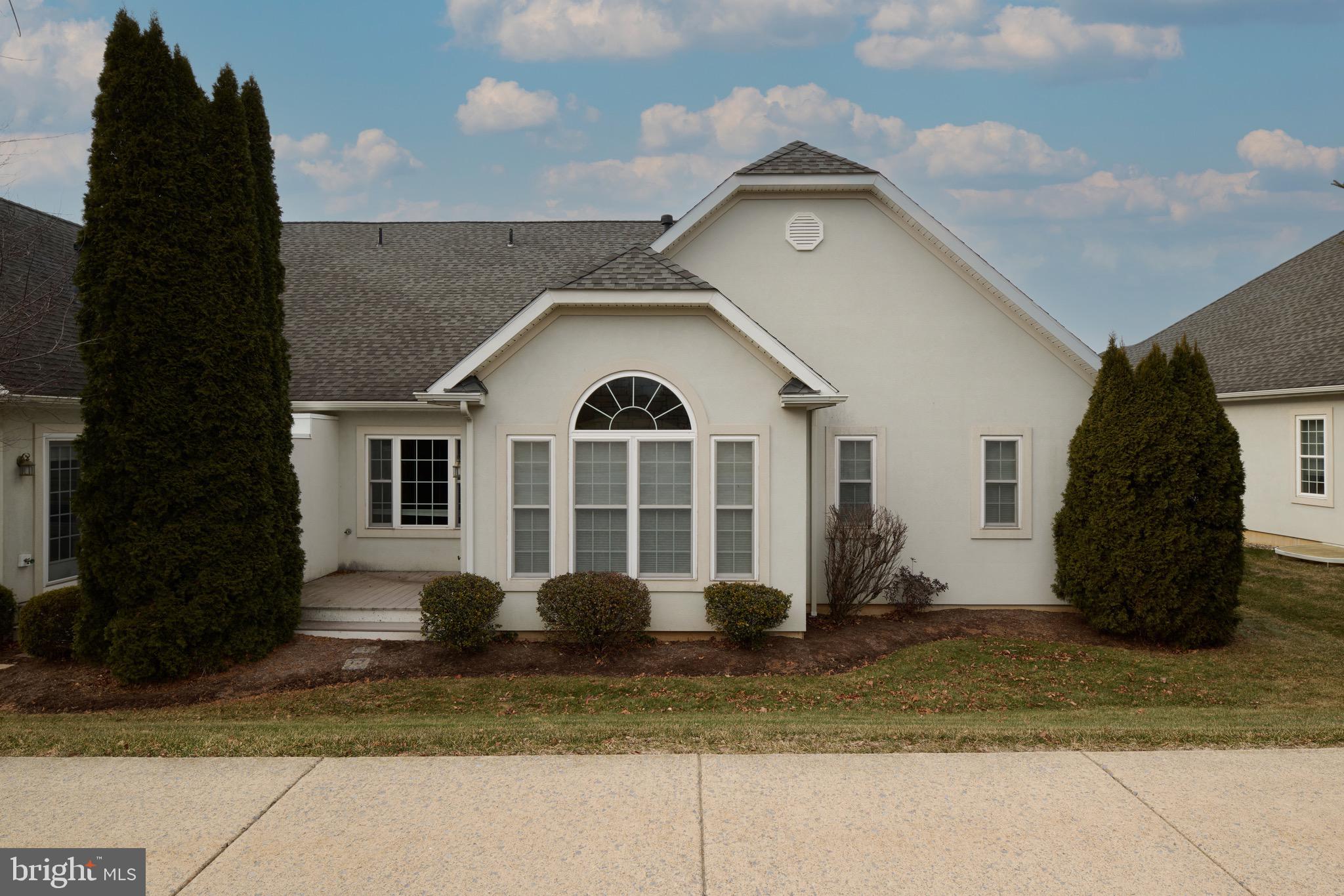 3222 Shellers Bend, Unit 209 State College, PA 16801 - Photo 69 of 76 a view of a white house with a yard