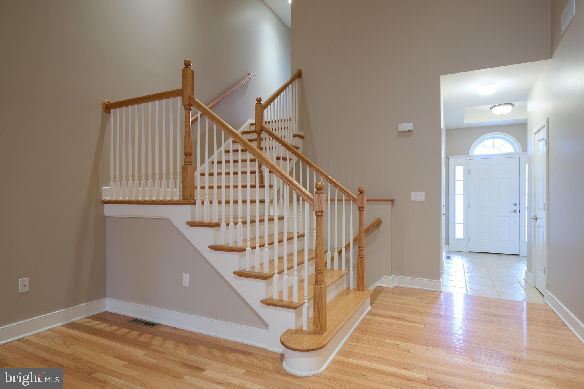 3222 Shellers Bend, Unit 209 State College, PA 16801 - Photo 10 of 76 a view of entryway with wooden floor