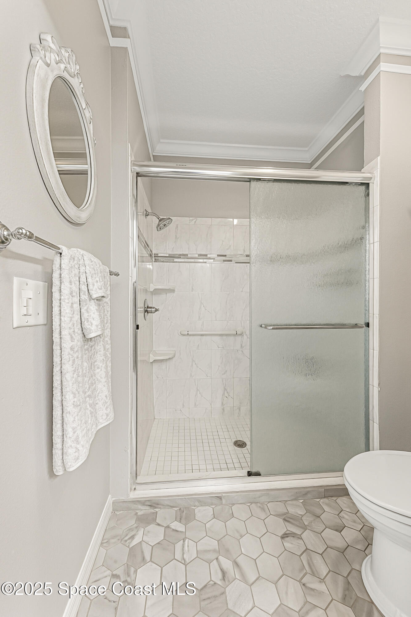 4331 Aberdeen Circle Rockledge, FL 32955 - Photo 13 of 63 a bathroom with a shower a toilet and a shower