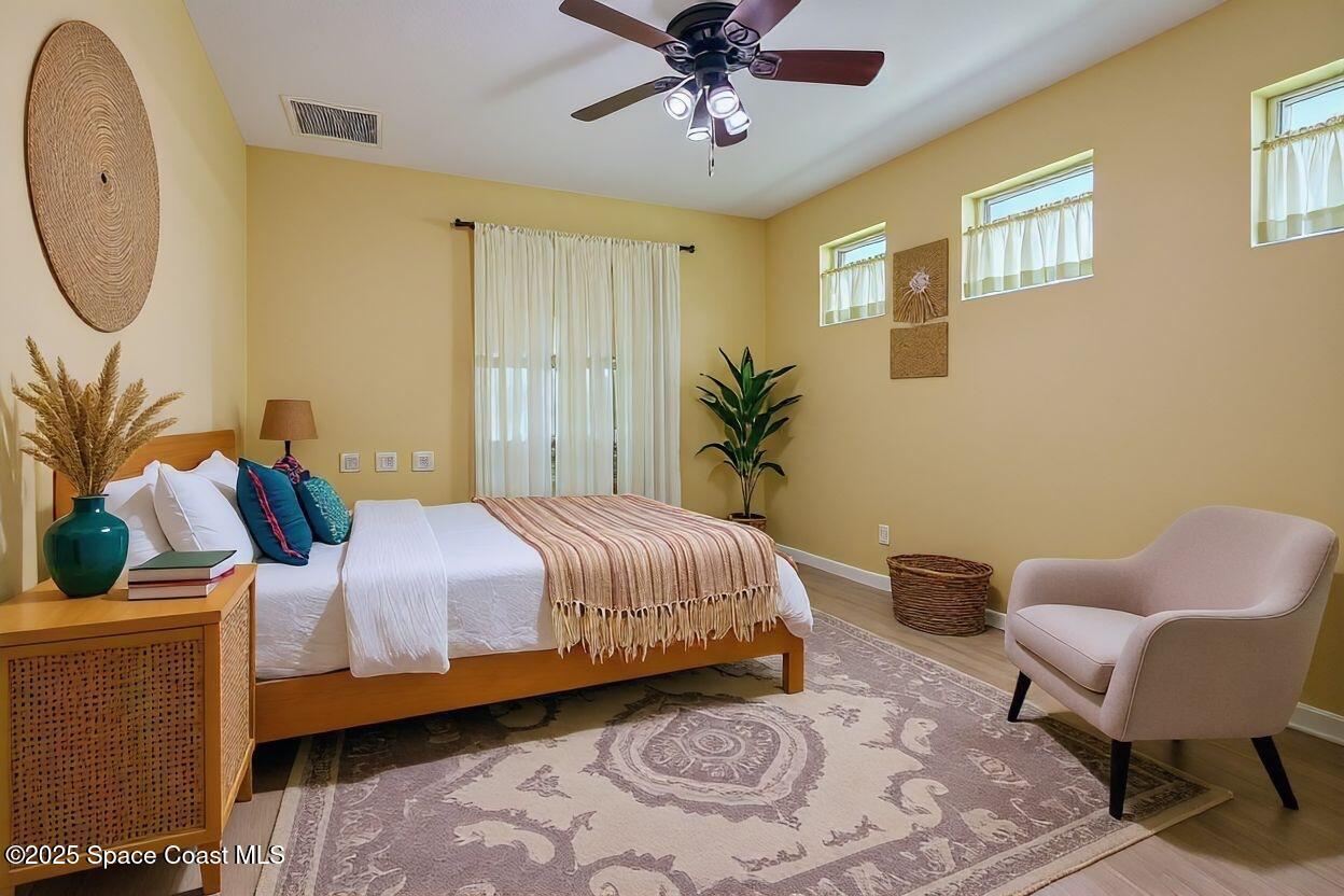 4331 Aberdeen Circle Rockledge, FL 32955 - Photo 14 of 63 a bedroom with bed and a window