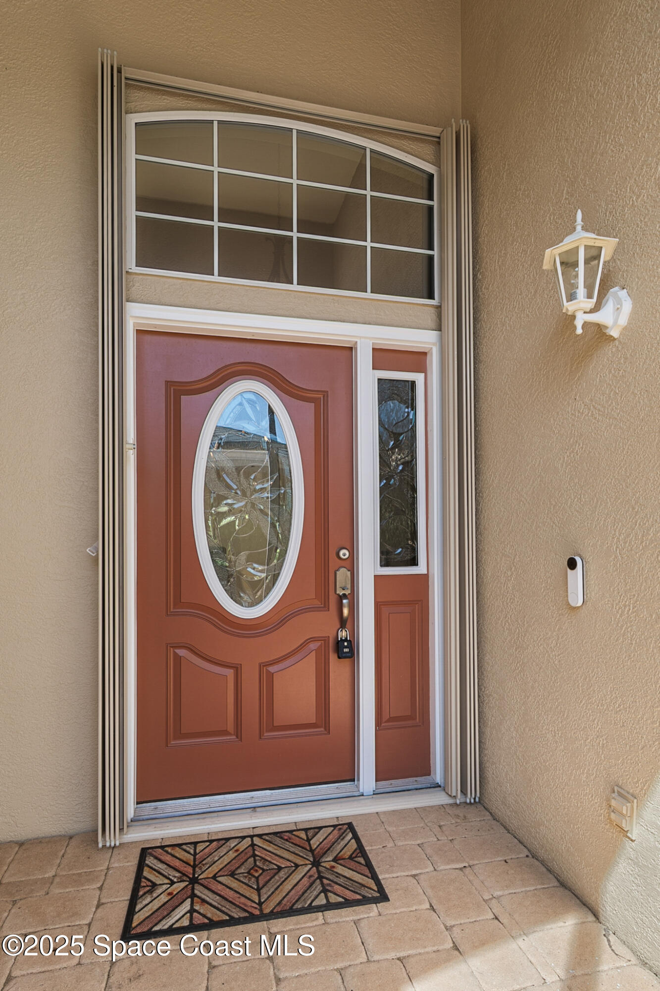 4331 Aberdeen Circle Rockledge, FL 32955 - Photo 2 of 36 a front view of a house with a garden