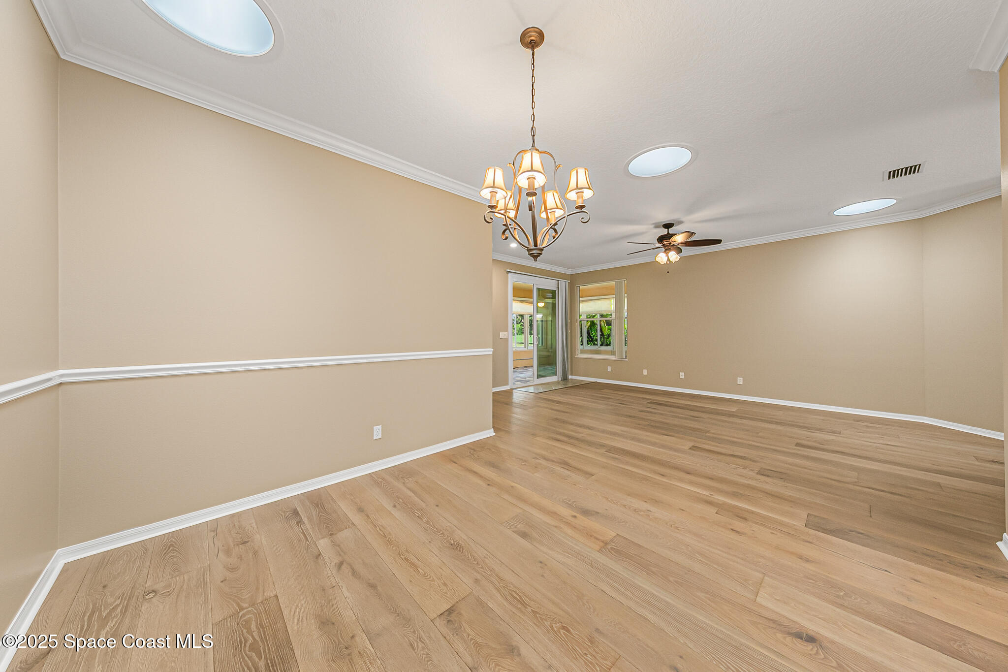 4331 Aberdeen Circle Rockledge, FL 32955 - Photo 28 of 63 a view of a chandelier in a room