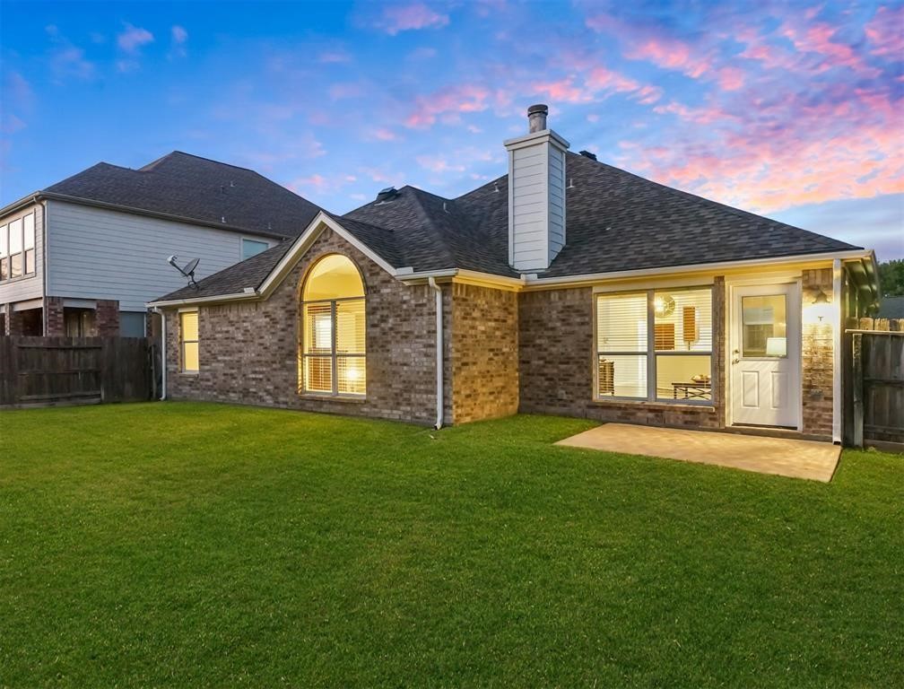 19715 Youpon Leaf Way Houston, TX 77084 - Photo 20 of 20 a view of an house with backyard space and balcony