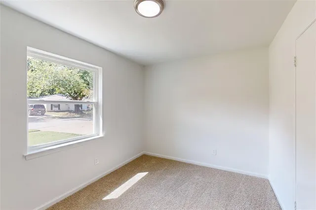 a view of an empty room with window