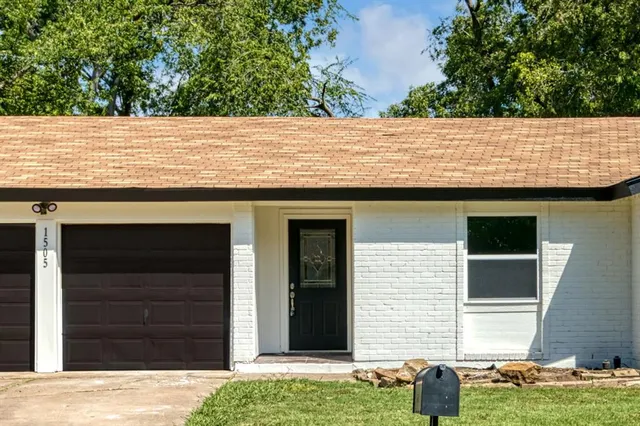 a view of house with front door