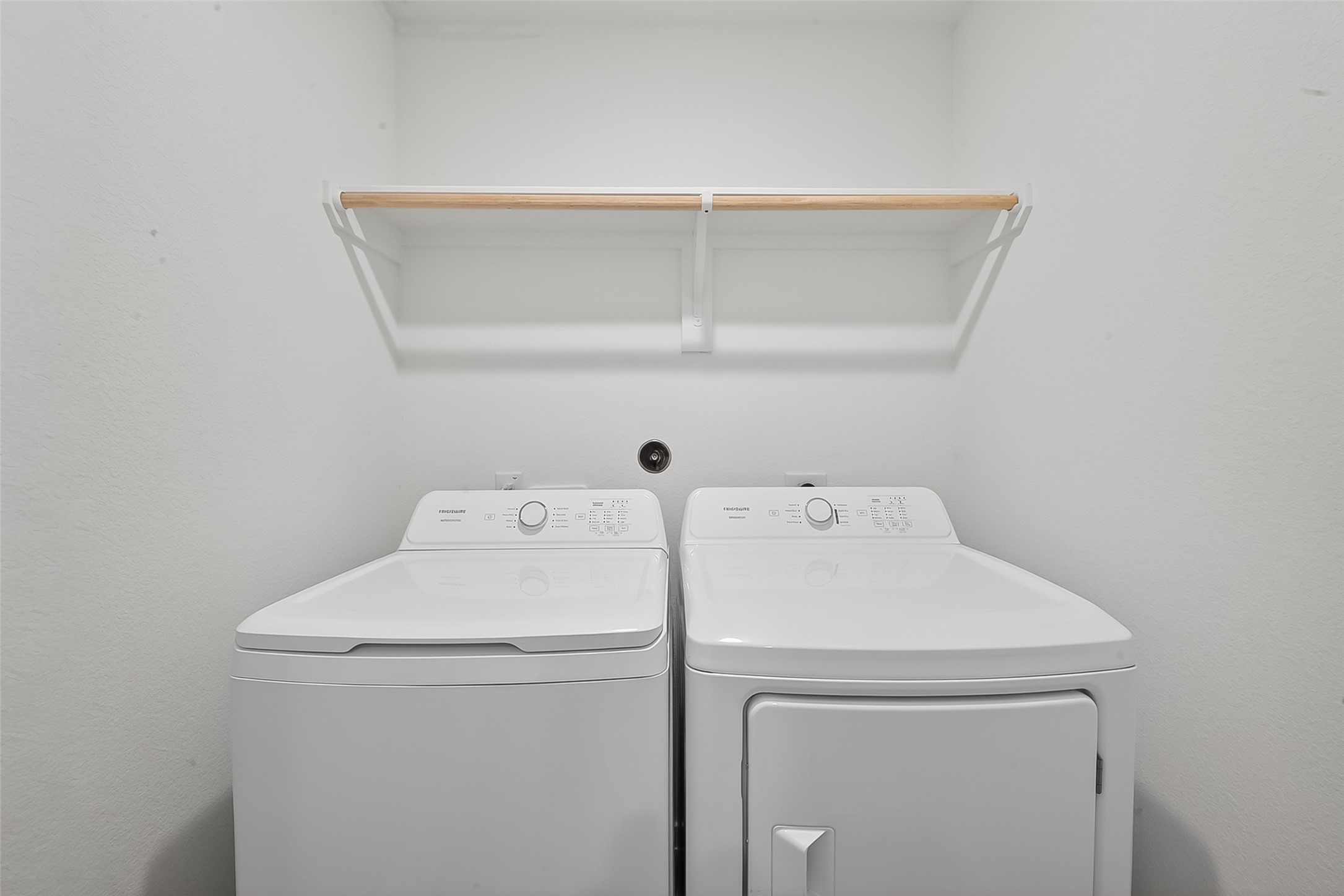 2623 American Ruby Drive Rosharon, TX 77583 - Photo 10 of 14 The laundry room is conveniently located near the primary suite.