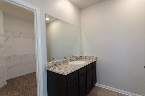 a bathroom with a shower and a toilet