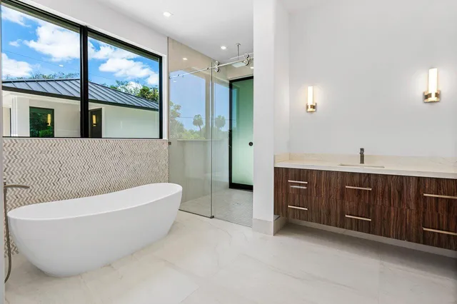 a view of a garden with an outdoor seating