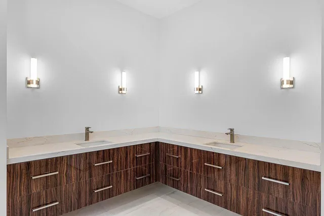 a view of a kitchen with a sink and a large window