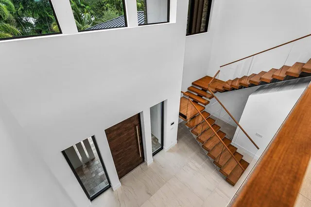 an aerial view of a house with a garden
