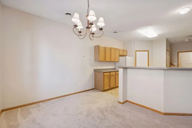 $304,900 | 18051 69th Place North, Unit 2006, Maple Grove, MN 55311