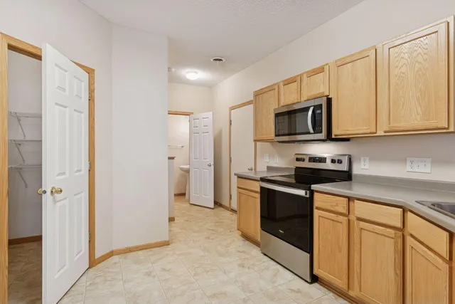 $304,900 | 18051 69th Place North, Unit 2006, Maple Grove, MN 55311