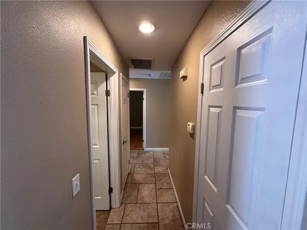 a bathroom with a glass door shower