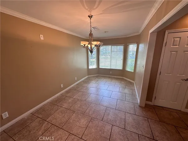 a view of a room with a chandelier