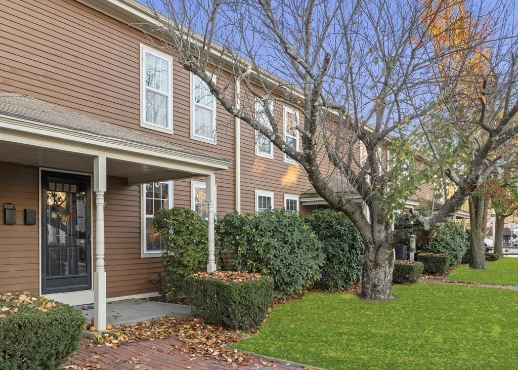 9 Sudbury Street, Unit 9 Maynard, MA 01754 - Photo 32 of 35 a view of a house with garden and tree s
