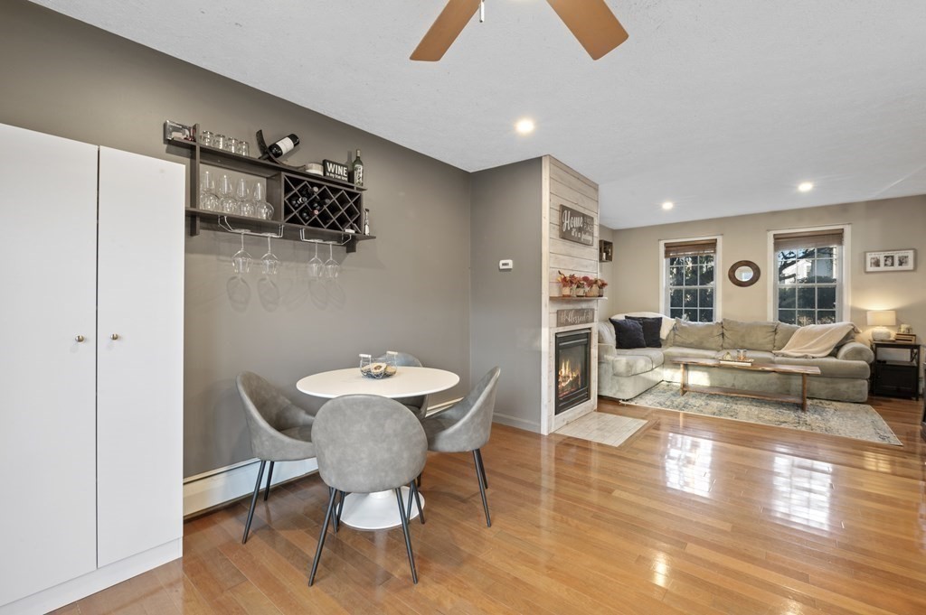 9 Sudbury Street, Unit 9 Maynard, MA 01754 - Photo 10 of 35 a living room with furniture and a table