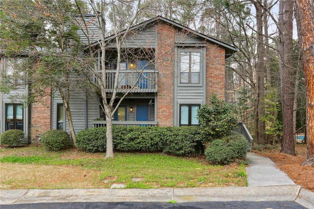 824 Tuxworth Circle, Unit 824 Decatur, GA 30033 - Photo 1 of 1 a view of a house with a yard