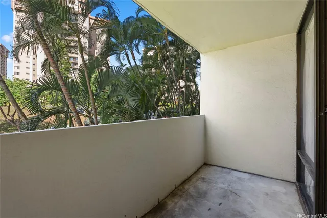 a swimming pool with outdoor seating and yard