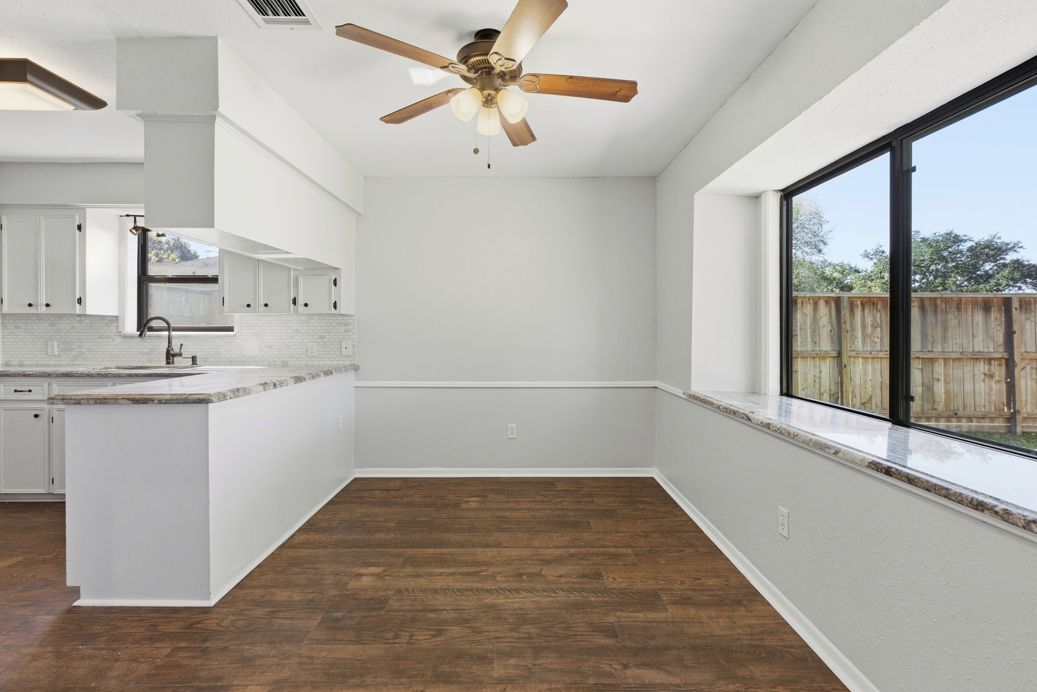 3721 Avenue R Rosenberg, TX 77471 - Photo 13 of 43 Light-filled breakfast space just off the kitchen, perfect for casual dining.