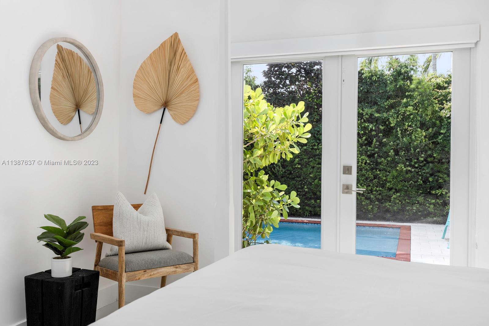 3020 Alton Road Miami Beach, FL 33140 - Photo 18 of 29 a view of a balcony with chairs