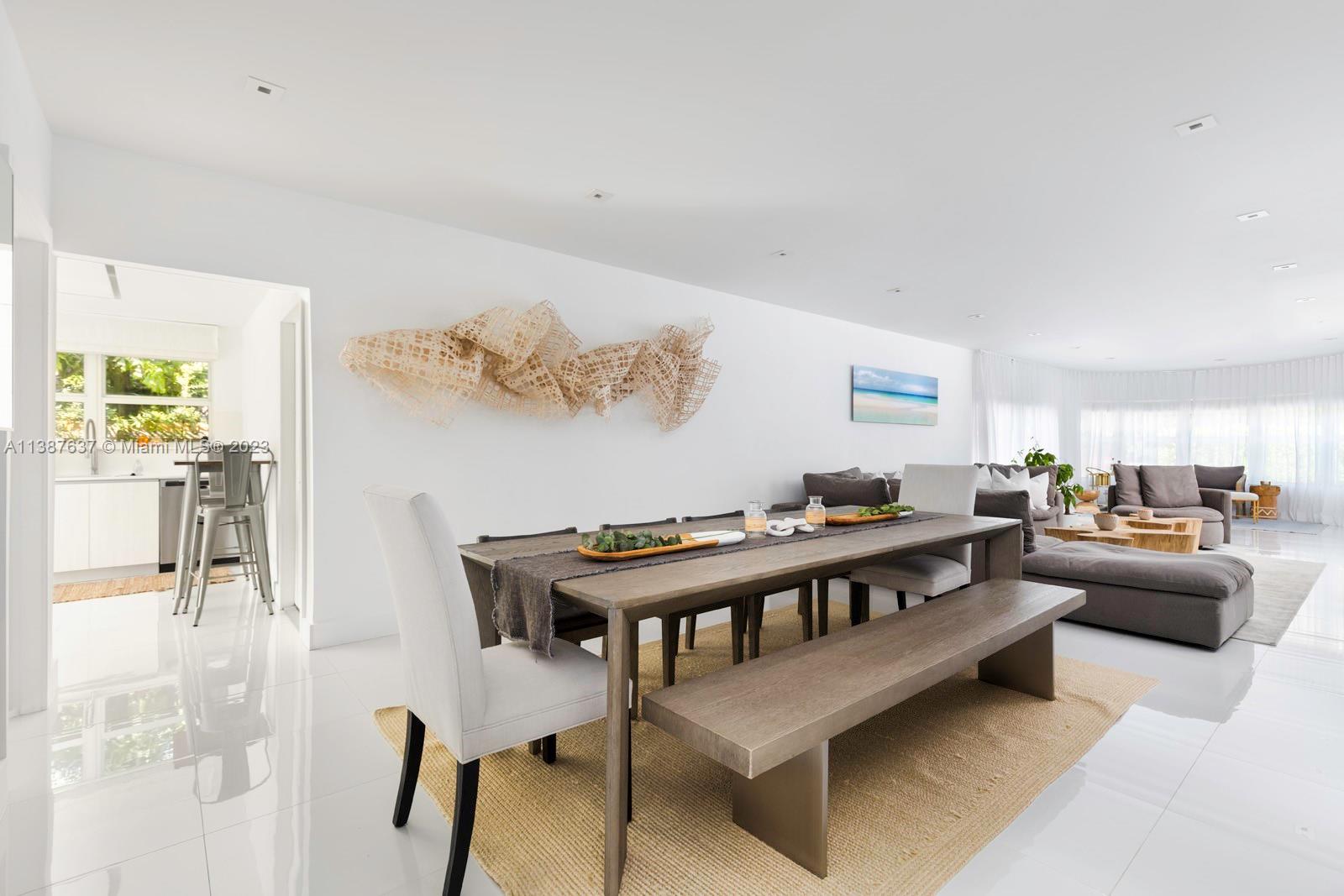 3020 Alton Road Miami Beach, FL 33140 - Photo 6 of 29 a view of a livingroom with furniture and a living room