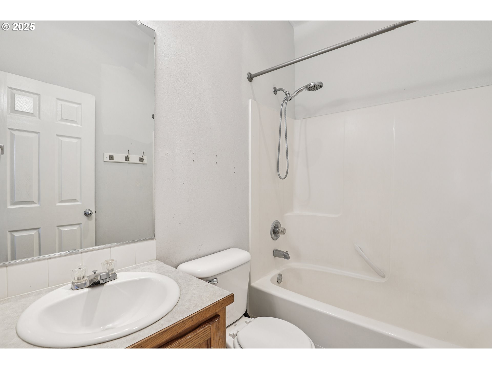 52866 Northeast 2nd Street Scappoose, OR 97056 - Photo 19 of 33 a bathroom with a sink and a bathtub