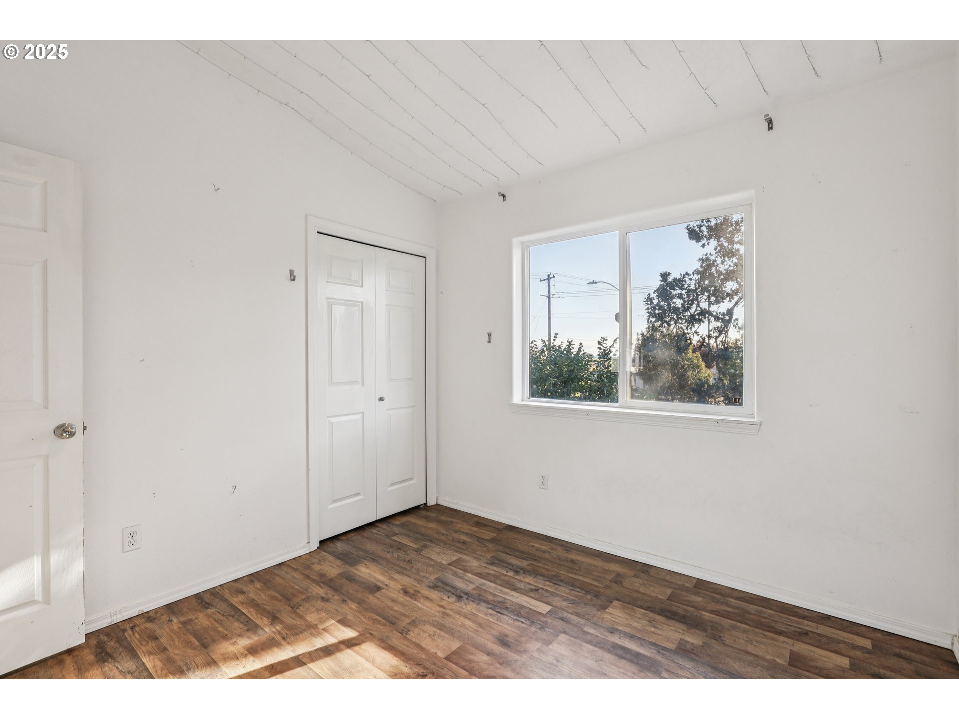 52866 Northeast 2nd Street Scappoose, OR 97056 - Photo 21 of 33 a view of an empty room with window and closet