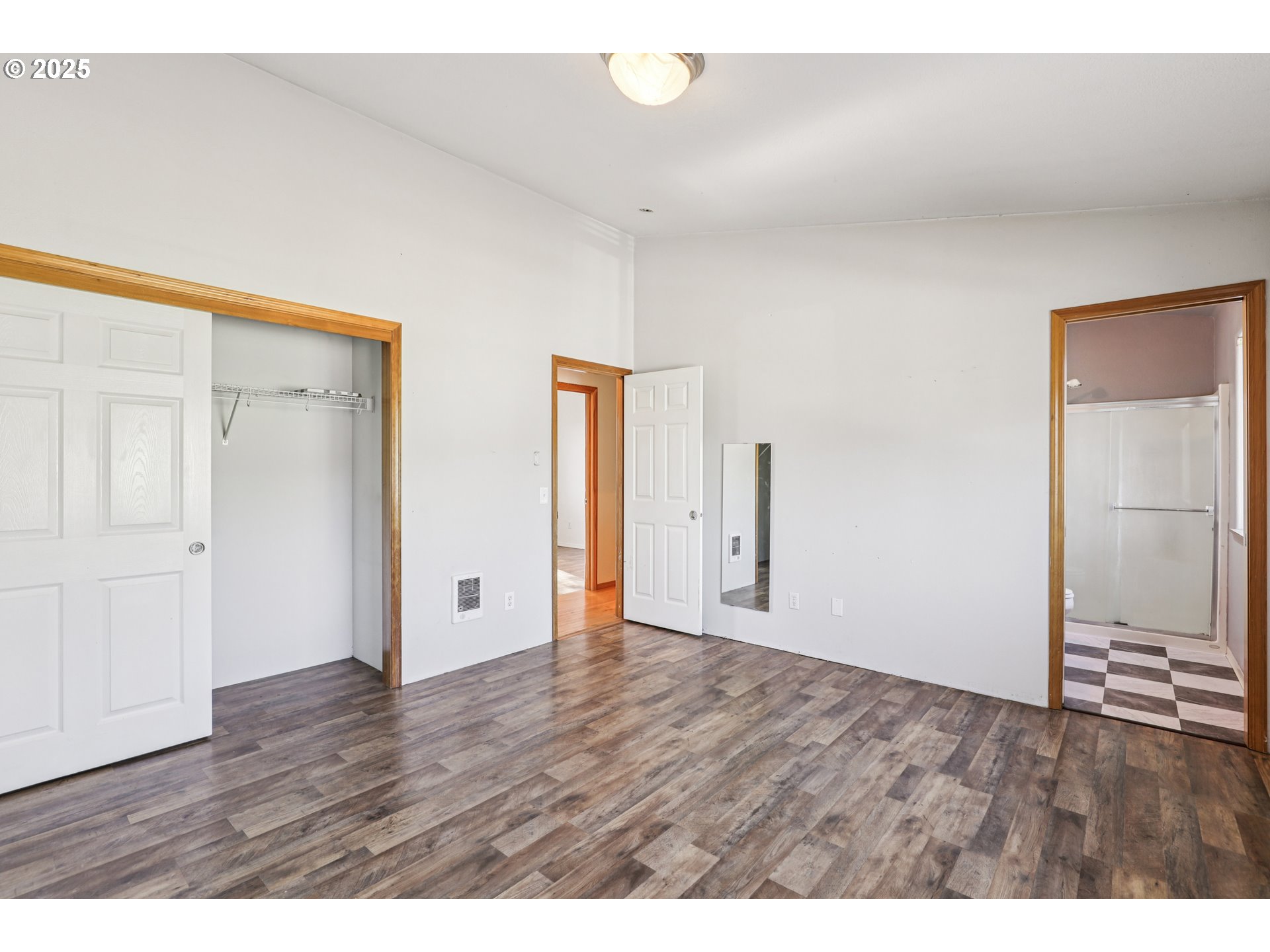 52866 Northeast 2nd Street Scappoose, OR 97056 - Photo 26 of 33 a view of an empty room with wooden floor