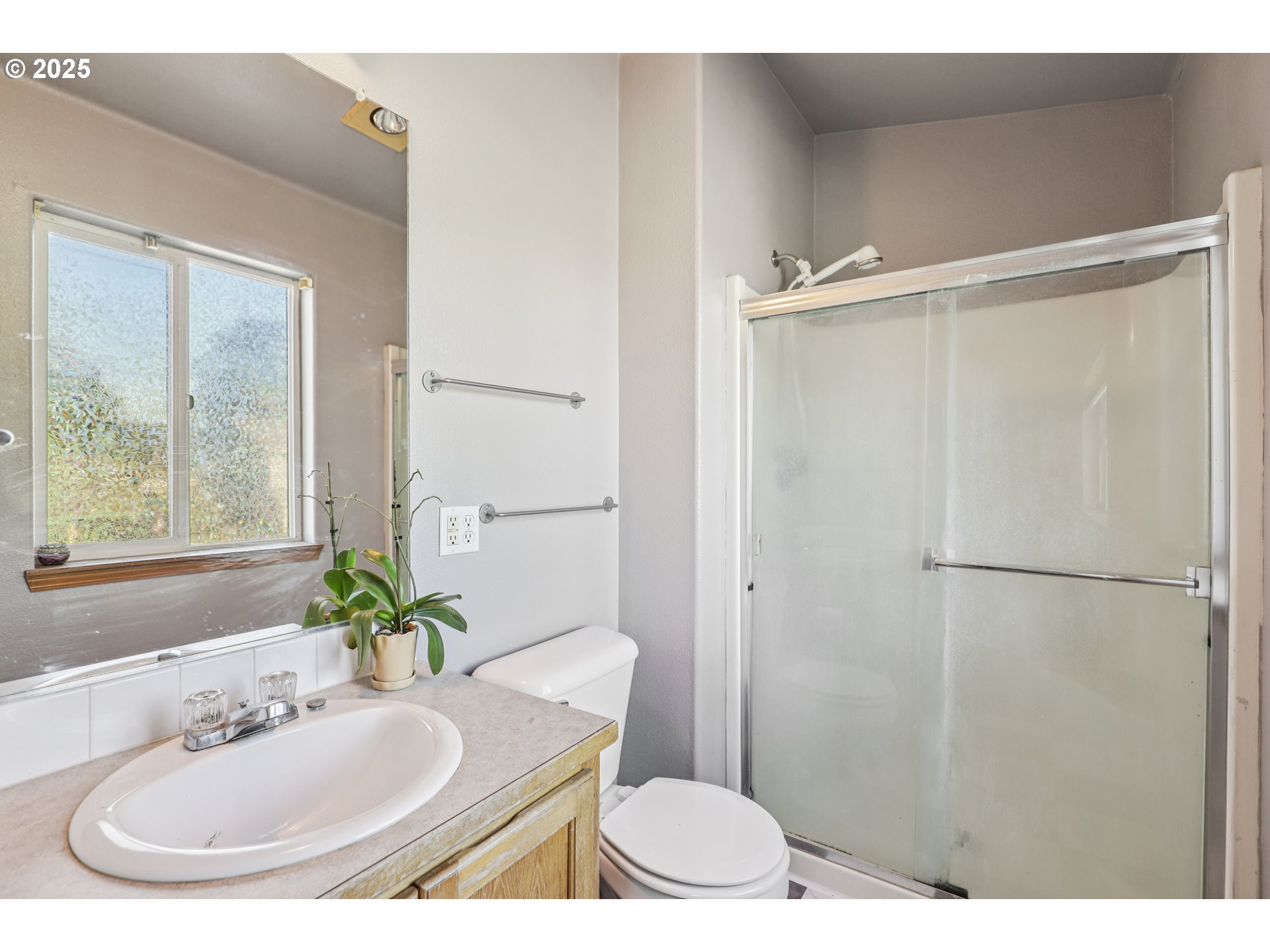 52866 Northeast 2nd Street Scappoose, OR 97056 - Photo 28 of 33 a bathroom with a sink and a mirror