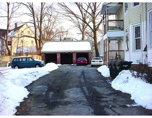 25 Grove Springfield Ma Springfield, MA 01119 - Photo 3 of 4 a view of a car park in front of house