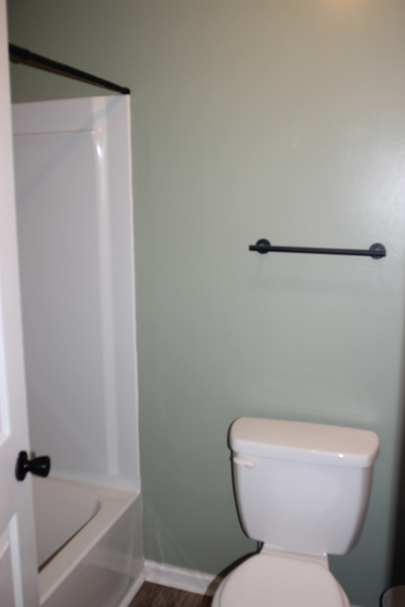 3847 Shellsford Road McMinnville, TN 37110 - Photo 18 of 20 a white toilet sitting next to a bathroom sink