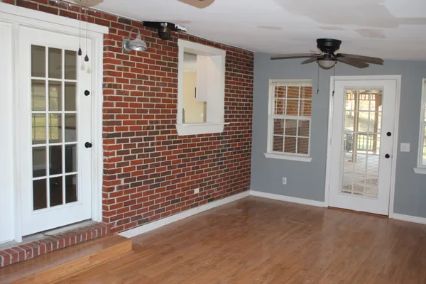 a view of empty room with windows