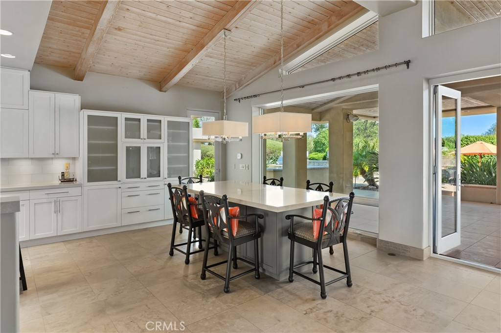 6533 Lago Lindo Rancho Santa Fe, CA 92067 - Photo 21 of 57 a view of a dining room with furniture window and outside view